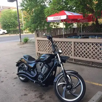 Blacked out with ape hanger bars. Aftermarket exhaust pipes. Extremely smooth ride.