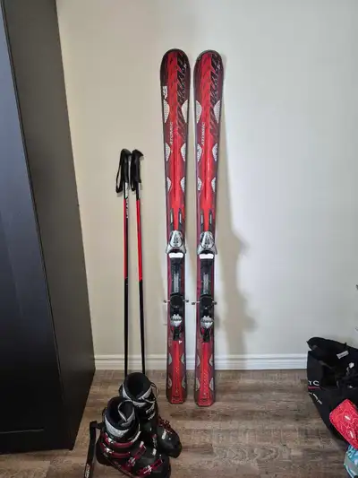 Ski Package: Atomic Nomad Skis + Salomon Boots & Head Poles High-performance all-mountain setup in e...