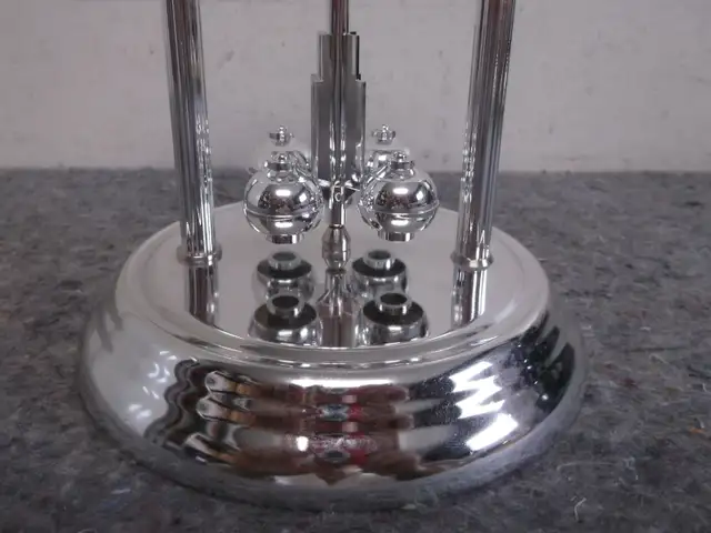 Haller Silver Anniversary Rotating Pendulum Mantel Clock63007359266051124