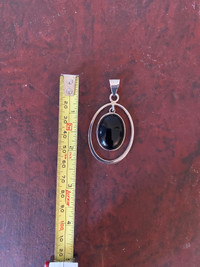 Vintage sterling silver with onyx pendant . 2.5”.