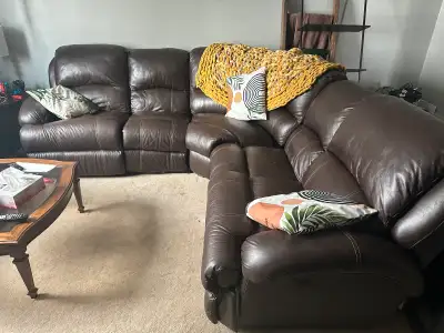 Real leather sectional, two power recliners in great shape