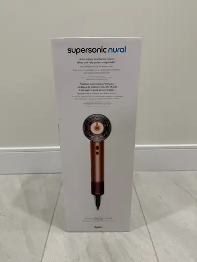 Brand new sealed Dyson supersonic nural in amber silk limited edition. The box is sealed and comes w...