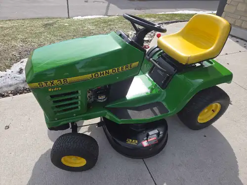 Selling John Deere STX38 lawn tractor. Completely rebuilt and tuned up. Runs excellent. 38"cutting d...