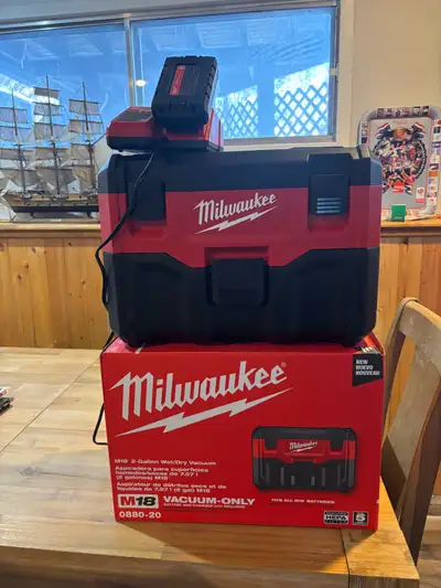 Milwaukee. M18 2 gal wet/dry vac with battery and charger , View more