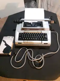 Machine à écrire électrique et portative