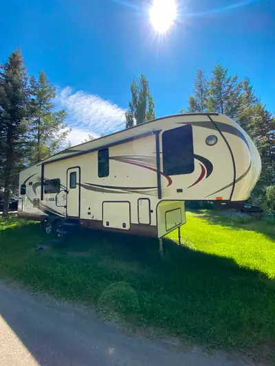 Trailer is great shape. Has 2 slides big awning sleeps 6. Full power electric auto leveling jacks.