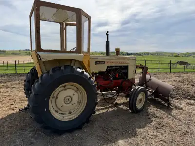 1600 Cockshutt tractor. Used to move snow. Run great. Rear PTO is removed but we have all the parts....