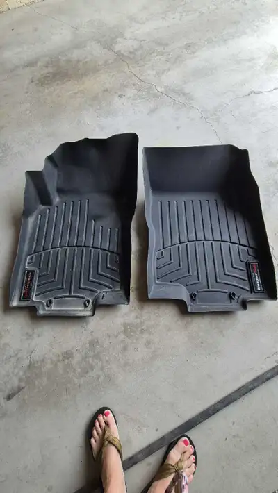 Keep your Nissan Rogue's interior pristine with these WeatherTech floor mats, designed to offer supe...