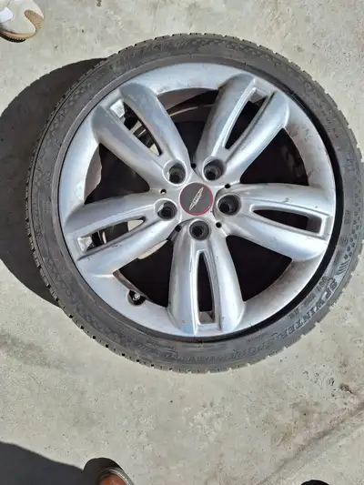 Mini Cooper - Dunlop SP Winter Sport 4D on Rims 5 bolt pattern, Tire size 205-45 R17 - Very little w...