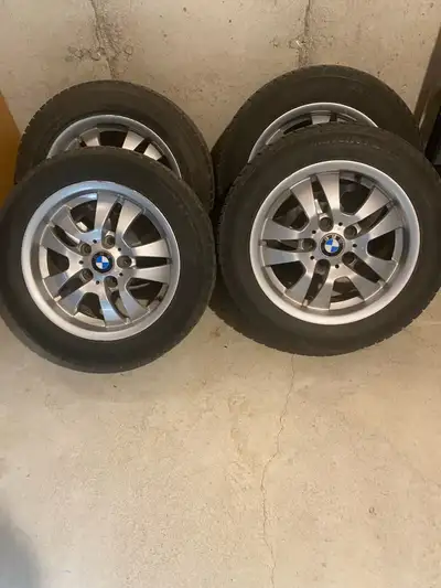 For sale is a set of four winter tires with rims, Continental 205/55/16, originally from a BMW 325i....