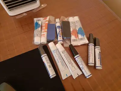 $5 each for a pen, $10 each for a scratch remover polisher package. Paint comes in black or white, o...