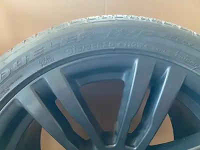 Staggered tire set of 4 Bridgestone Tires with Authentic BMW Black Rims - 2 x 315/35R20 & 2 x 275/40...