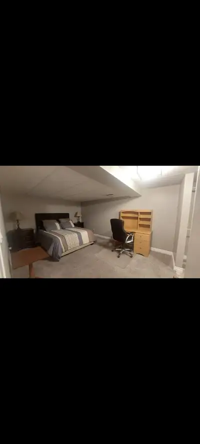 Large basement room with private 3 piece ensuite for rent in Millrise. Close to LRT, shopping, fish...