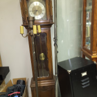 Grandfather clock i. A walnut finish, mechanical chain