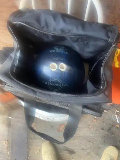 2- 10 pin bowling balls with bags. 1 10lbs. 1 8lbs. Fingers drilled, may need to be filled and re-dr...