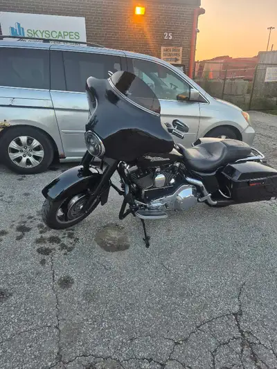 Solid bike. 88ci no issues. Safetied. New seals, Cam tensioner replaced. 75000km. Blacked out front....
