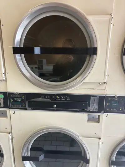 3 double stack dryers. 2 work perfectly and one has a broken drum