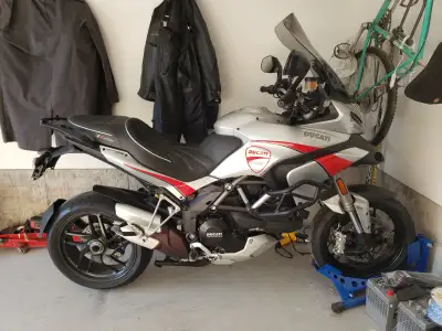 Bike is in mint condition, lightly used, new Corbin seat, panniers,oil and filter changed, being sol...