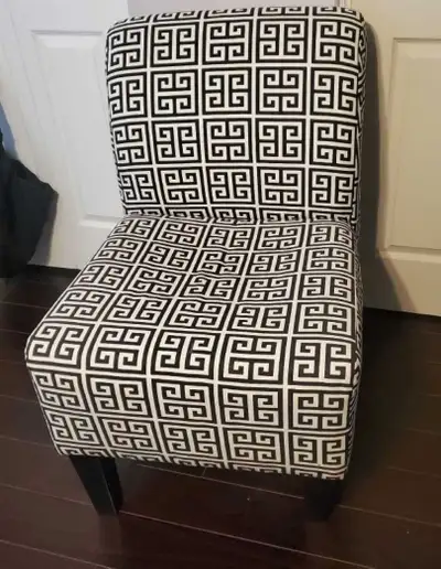 Black and white geometric pattern chair. Its bold design makes i, View more
