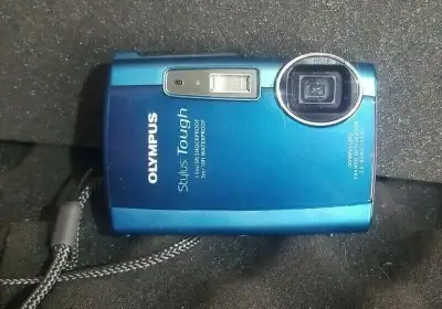 Olympus Stylus Tough 3000 Digital Camera like new 12-megapixel resolution for high-quality, poster-s...