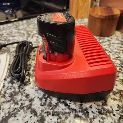 Milwaukee Tool M12Lithium-Ion 2.0 Battery & Charger Starter Kit Model # 48-59-2420 Store SKU # 10008...