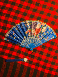 Foldable handcrafted fan, retro traditional style in blue