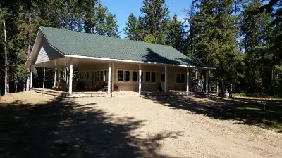 A Beautiful acreage for sale: WEST OF PIGEON LAKE Quiet country cottage nestled in the spruce trees....