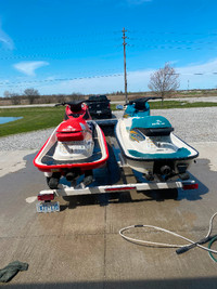 Two jetskis and trailer