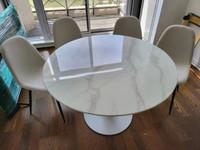 Marble patterned rock slab dining table and four matching chairs
