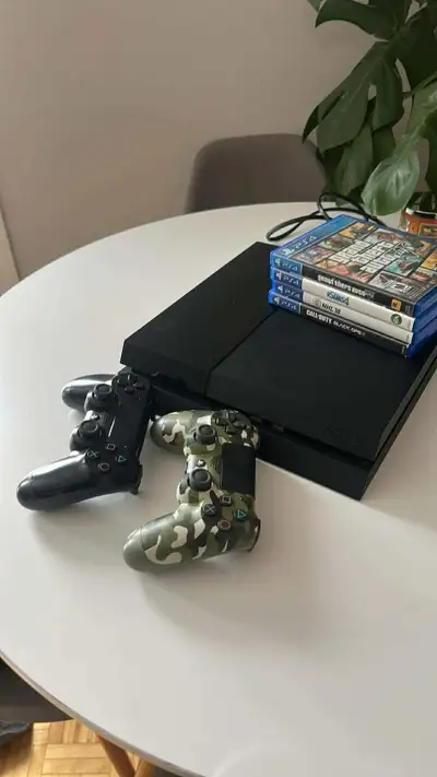 PS4 W/ controller & 4 games , View more