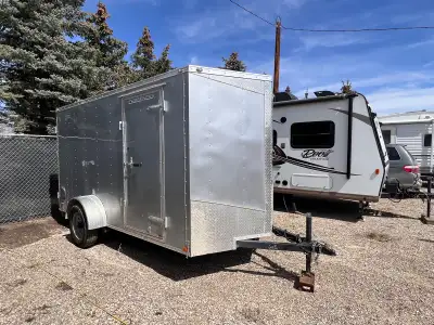 6 x 12+2’ V cargo enclosed trailer with barn doors up to 3000 pounds 2 inch ball 60$ a day weekly ra...