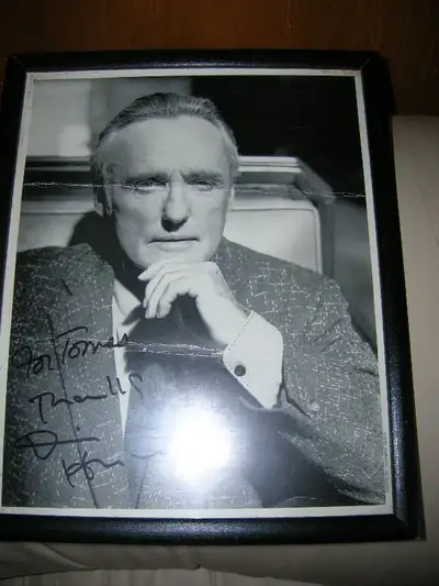 Selling a rare collectible personally autographed framed promo picture black and white 8 by 10 photo...