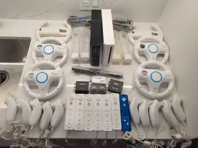 Wii Consoles, Controllers, Nunchucks, Cords, & Accessories!, View more