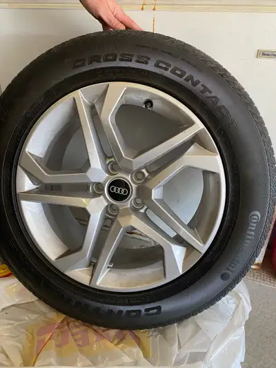 Selling 4 Audi all season tires with rims. a Continental Cross Contact 235/60 R18 103H M+S tire moun...