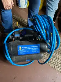 Air compressor with hose
