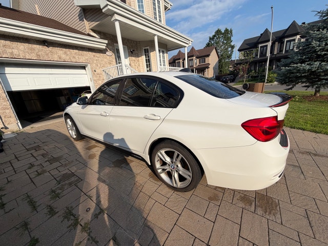 BMW 320i xdrive sedan — photo 5