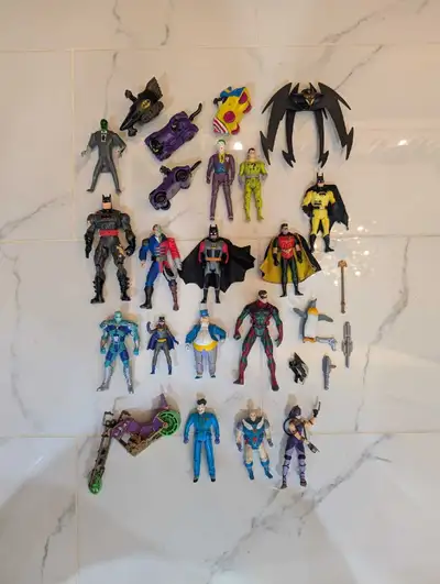Selling a collection of vintage Batman action figures! Includes various characters like Batman, Robi...