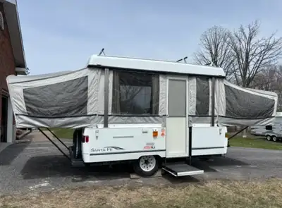 2003 Coleman Santa Fe Pop-up camper. Well maintained and ready for camping. This camper has been wel...