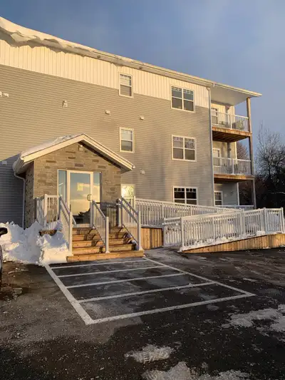 Description: Private 3rd-floor corner unit (1,200 sq. ft.) located at the back of a secure building....