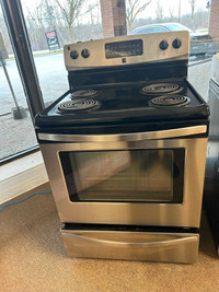 Used Kenmore 30 inch wide stove with warranty 