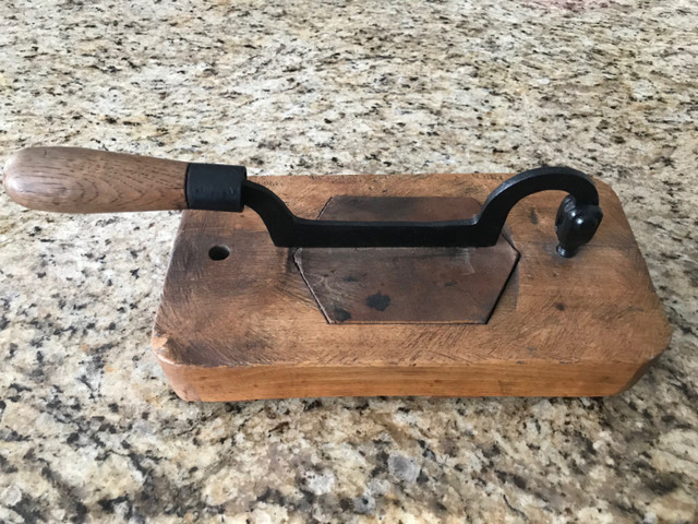 Old wooden tobacco cutter - thick wood. $50.00.  This is a beaut in Arts & Collectibles in Charlottetown - Image 2