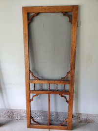 Wooden screen door with character