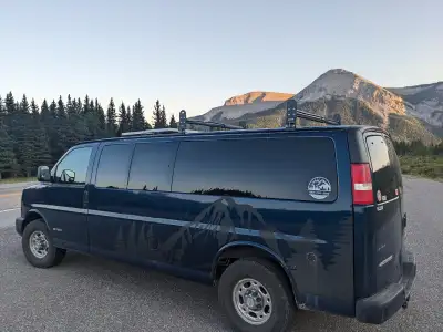 Converted Chevrolet Express 3500 that runs and works very well. Everything for camping is included,...