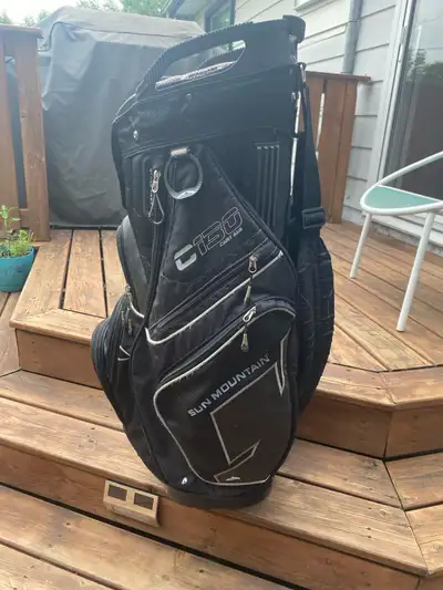 Sun mountain golf bag in fairly good condition, one ziper is broken everything else is nice and clea...