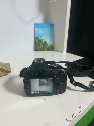 Nikon D3400 with kit lens, View more