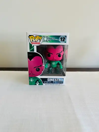 Emerge as a standout in your collection with the RARE/VAULTED Funko Pop Green Lantern Sinestro #12 V...