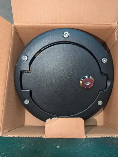 Jeep JK fuel door. Replaces fuel bezel. For 2012 to 2018 Wrangler Rubicon ect.