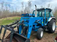 Ford 5610 tractor with FEL and Grapple