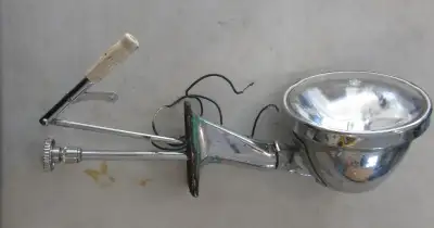 Vintage Chrome Boat Spot Light. 22 in. long. It swivels and extends longer. My buddy says it's off a...