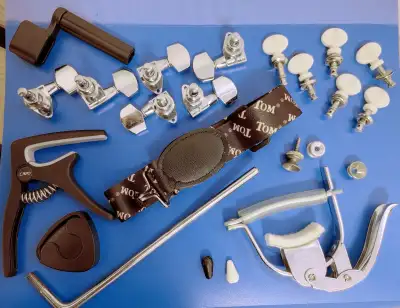 Assorted guitar / bass / ukulele accessories $2 each, $5 for all, View more